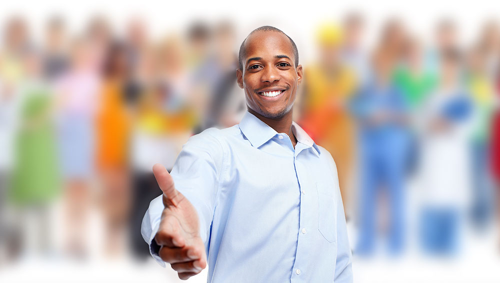 man with hand outstretched, welcoming