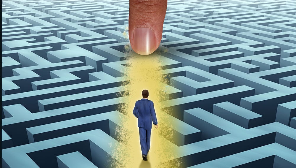 man walking on maze 